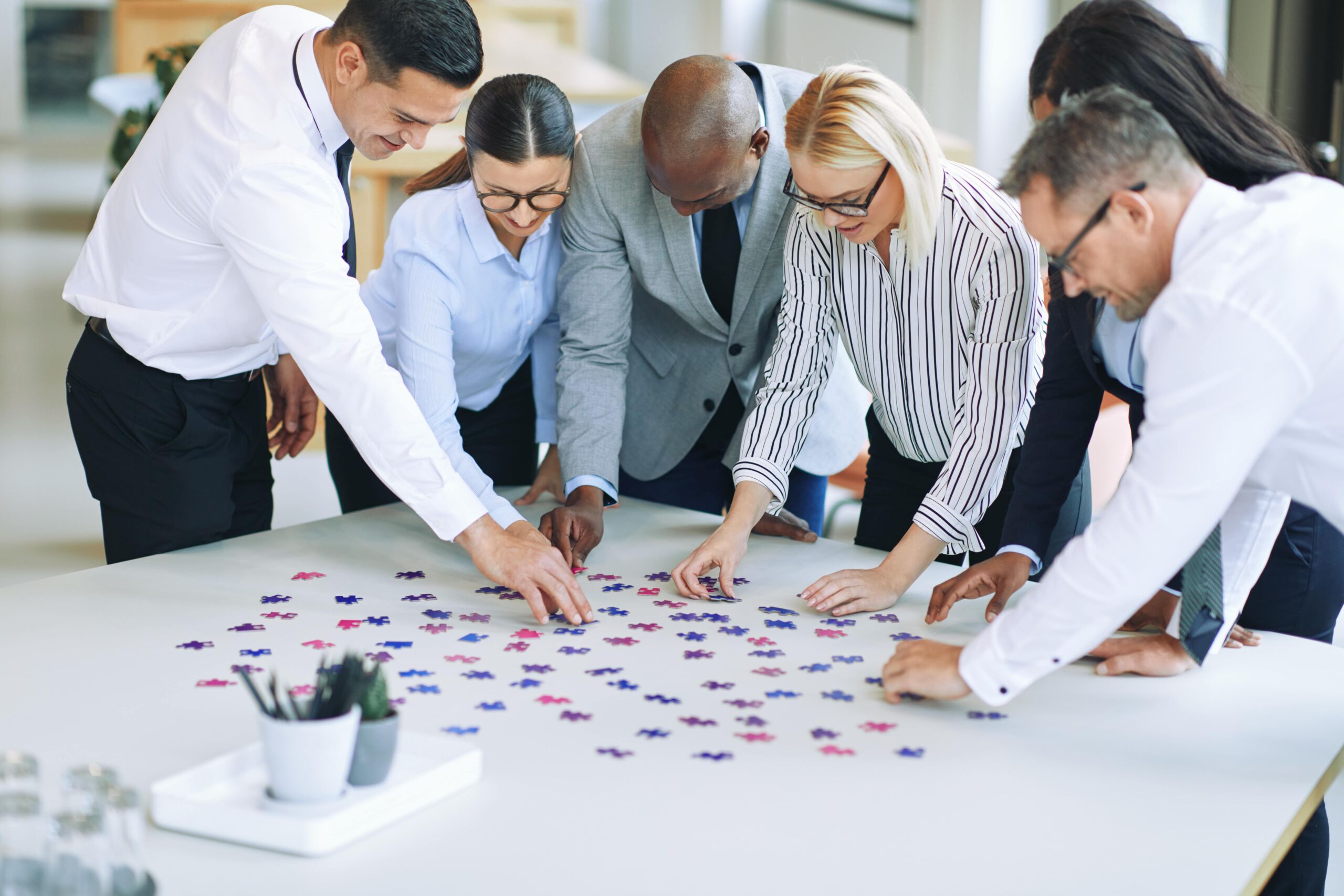 Team working together to solve a puzzle