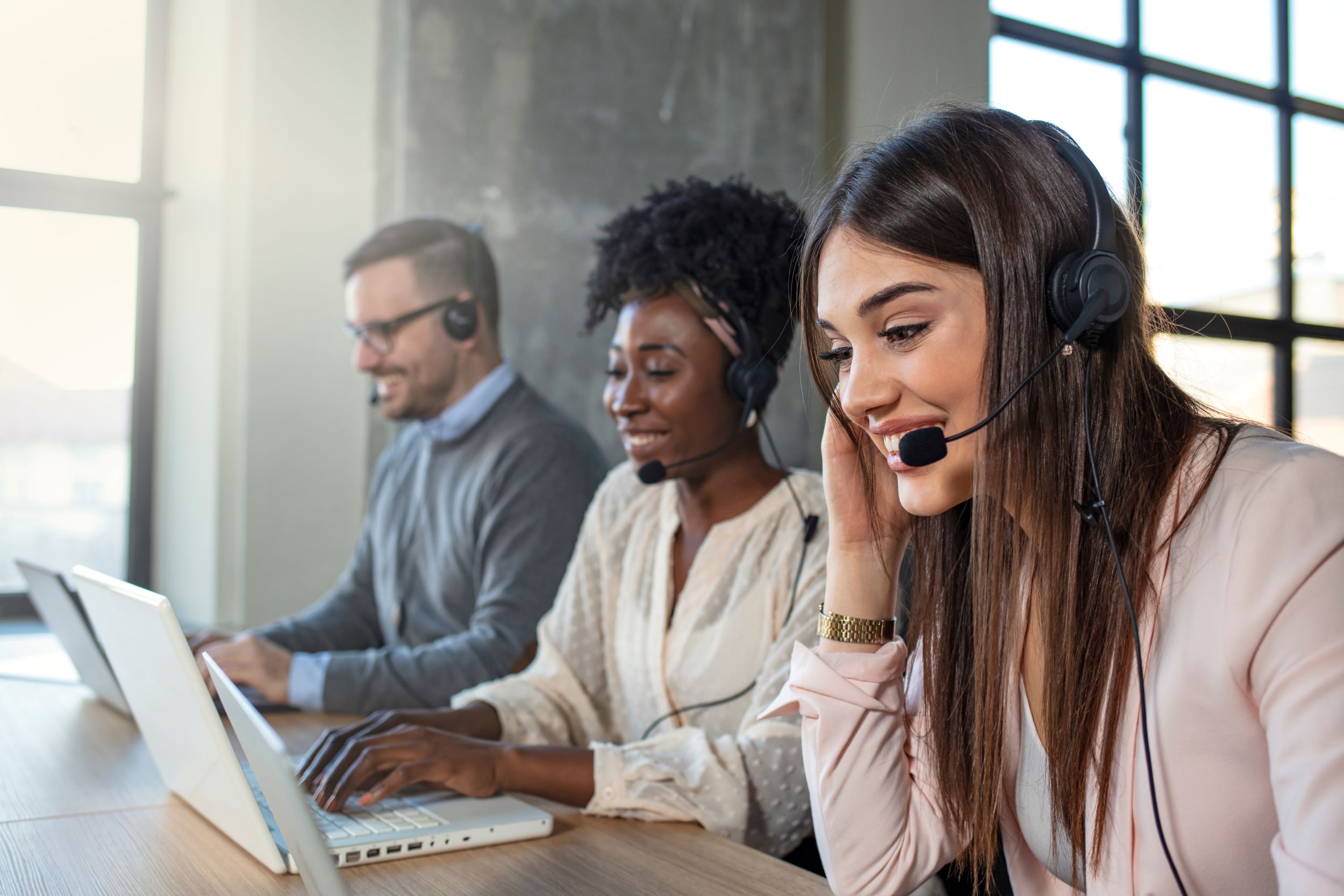 customer service workers smiling